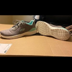 Skechers tennis shoes. Only worn once.